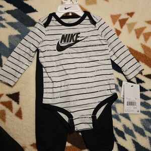 Nike Black and White Striped Kids Bodysuit And Pants Set.